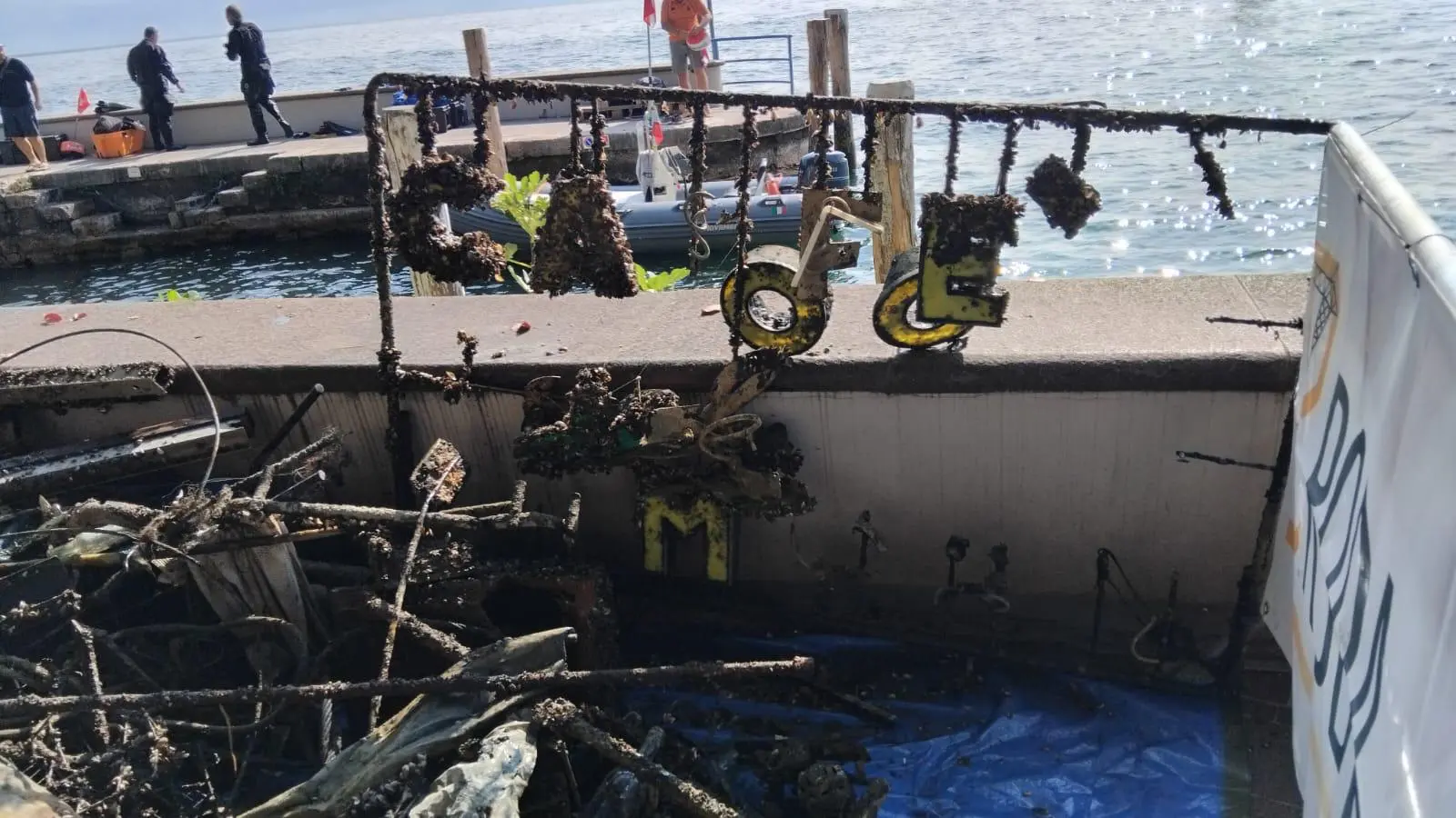Puliamo i fondali: l'esito della pulizia nel lago di Garda a Gardone
