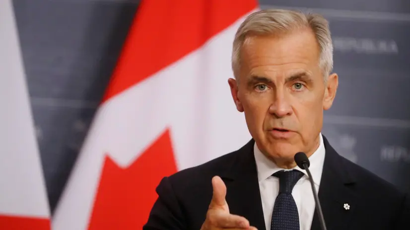 epa12324393 Canadian Prime Minister Mark Carney attends a joint press conference with his Latvian counterpart after their meeting in Riga, Latvia, 26 August 2025. The two leaders met to strengthen bilateral relationships between the two countries and advance cooperation in key areas, including trade, energy, and collective defense. EPA/TOMS KALNINS