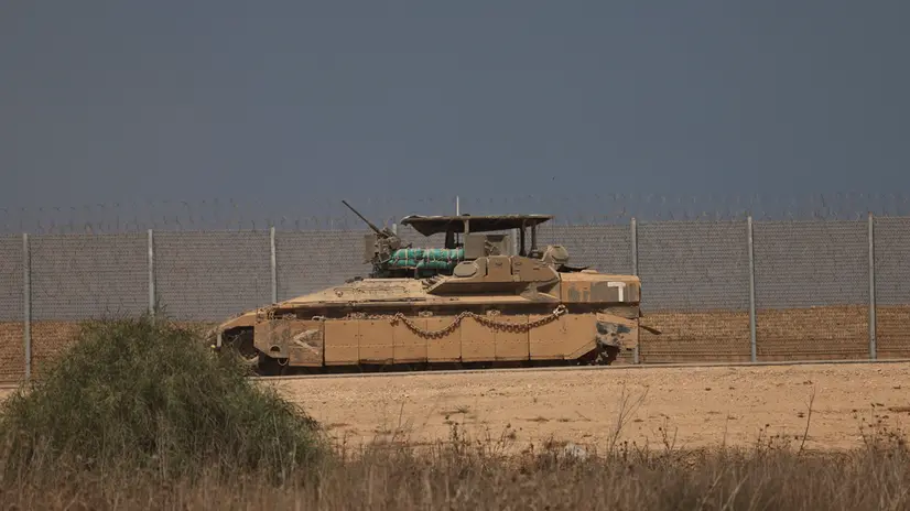 epa12381702 An Israeli Armored Personnel Carriers (APC) is deployed along the Israel-Gaza border in southern Israel, 16 September 2025. Israeli Prime Minister Benjamin Netanyahu confirmed during a court appearance that the Israeli military has begun a major operation in Gaza City. More than 64,800 people have been killed in the Gaza Strip since October 2023, according to the Palestinian Ministry of Health. EPA/ATEF SAFADI