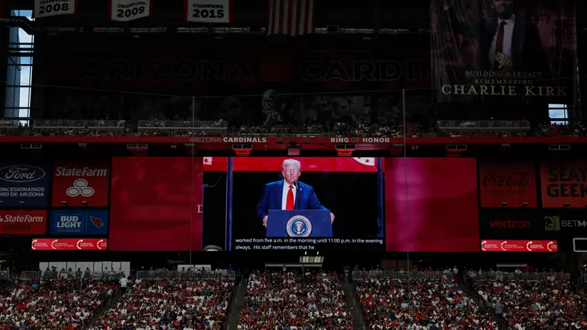 epa12396861 US President Donald Trump speaks during the public memorial service of political activist Charlie Kirk at State Farm Stadium in Glendale, Arizona, USA, 21 September 2025. Kirk was shot and killed on 10 September during a stop on his American Comeback Tour organized by Turning Point USA at Utah Valley University. EPA/CAROLINE BREHMAN