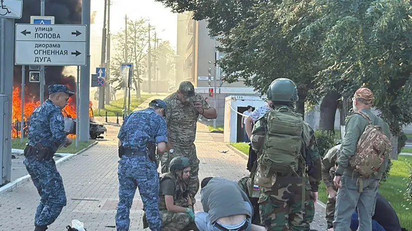 epa12299579 A still image taken from a handout video made available by the official telegram channel of the Governor of the Belgorod Region, Vyacheslav Gladkov, shows Russian officers giving first aid to an injured person after a reported Ukrainian drone strike in Belgorod, Russia, 14 August 2025. Three civilians were injured after a Ukrainian drone struck a car in the center of Belgorod, the region's governor said. EPA/BELGOROD REGION GOVERNOR VYACHESLAV GLADKOV VIA TELEGRAM HANDOUT -- MANDATORY CREDIT -- BEST QUALITY AVAILABLE -- HANDOUT EDITORIAL USE ONLY/NO SALES/NO ARCHIVES