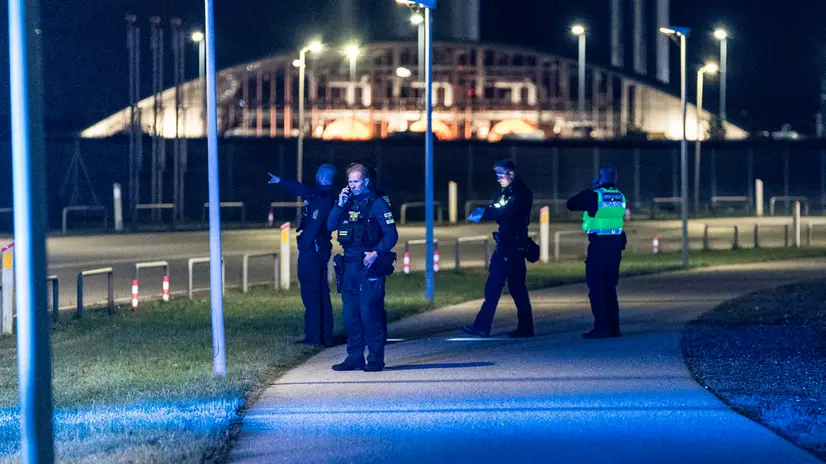 epa12398542 Danish police officers are present at Copenhagen Airport, planes cannot land or take off due to drone sightings, in Copenhagen, Denmark 22 September 2025. EPA/STEVEN KNAP DENMARK OUT