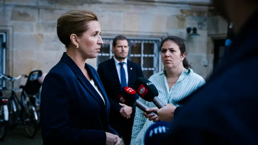 epa12399279 Prime Minister Mette Frederiksen holds a doorstep at Christiansborg Palace and comments on drone activity at Copenhagen Airport, in Copenhagen, Denmark, 23 September 2025. Drones were spotted near Copenhagen Airport on the evening of 22 September, and the airspace over Copenhagen was closed for four hours on the night leading to 23 September. EPA/Emil Nicolai Helms DENMARK OUT