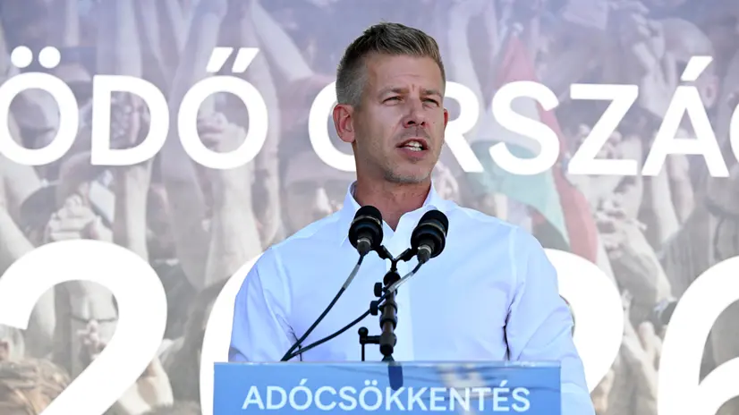 epa12359655 MEP and leader of the Hungarian opposition Tisza Party Peter Magyar speaks during a Tisza rally in Kotcse, southwestern Hungary, 07 September 2025. The slogan on the lectern means 'tax cut.' EPA/Zsolt Szigetvary HUNGARY OUT