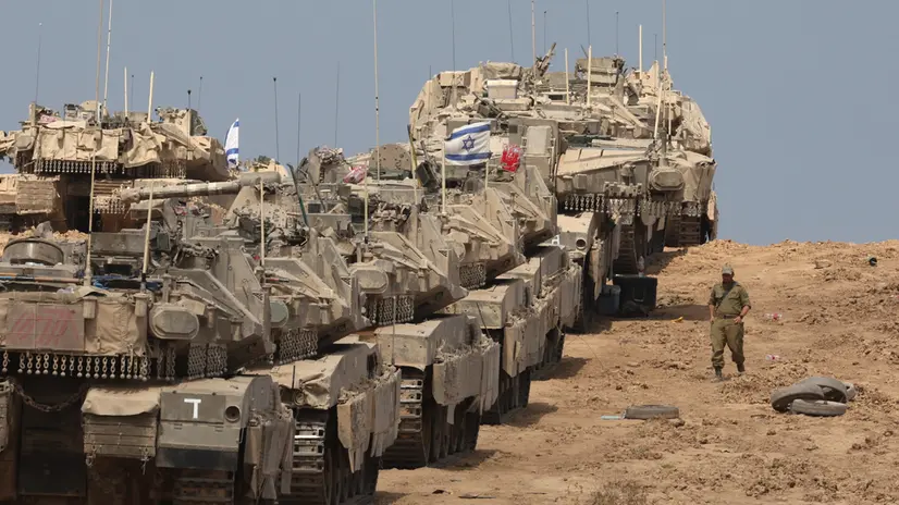 epa12384116 Israeli tanks deployed near the border with the Gaza Strip in southern Israel, 17 September 2025. Israel ramped up its offensive in the Gaza Strip on 16 September. More than 64,900 Palestinians have been killed in the Gaza Strip since October 2023, according to the Palestinian Ministry of Health. EPA/ABIR SULTAN