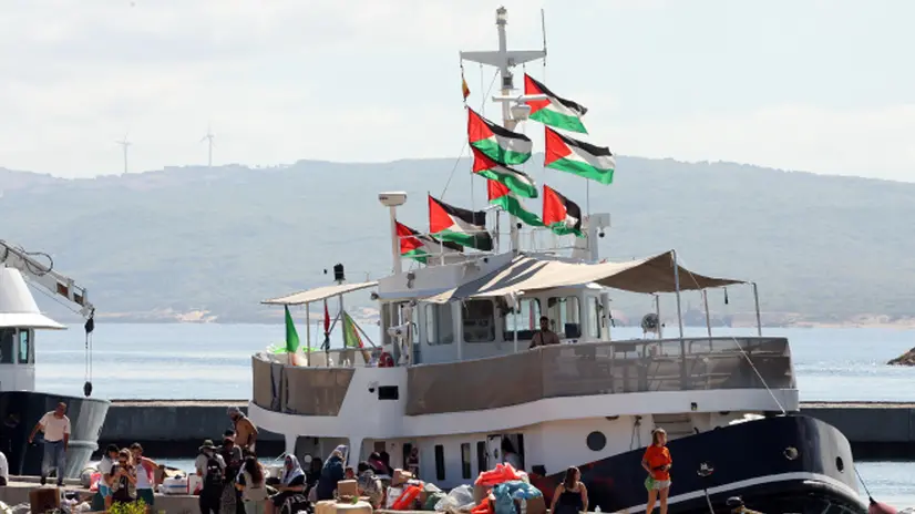 epa12372806 Participants of the Global Sumud Flotilla (GSF) wait to set sail towards Gaza along with other boats at the port of Bizerte, Tunisia, 13 September 2025. The Gaza-bound GSF flotilla is an international maritime initiative that began sailing in August 2025, aiming to break the Israeli blockade and deliver vital aid to the Gaza Strip. EPA/MOHAMED MESSARA