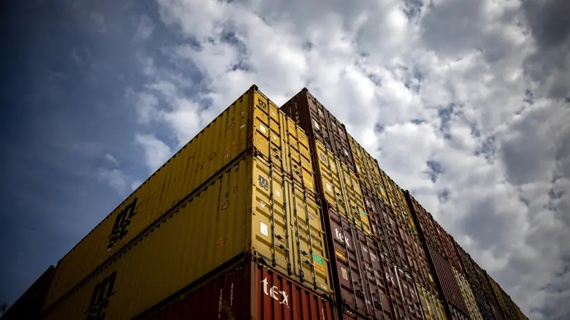 epa12031435 Containers are stacked at a transshipment terminal in Prague, Czech Republic, 14 April 2025. US President Trump initiated a trade war with most of America's trading partners, as several countries were granted a temporary tariffs exemption. EPA/MARTIN DIVISEK