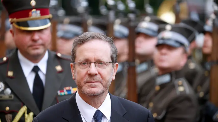 epa12284104 Israeli President Isaac Herzog attends an official ceremony, welcomed by Latvian President Edgars Rinkevics (not pictured), in Riga, Latvia, 05 August 2025. Herzog is on an official visit to Latvia. In addition to Latvia, he is also visiting Lithuania and Estonia. The visit aims to strengthen ties, promote hostage diplomacy, and honor the memory of the Holocaust across the Baltic states. EPA/TOMS KALNINS