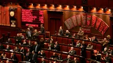 Il Tabellone della Camera dei Deputati con il voto dell'aula sulla legge Finanziaria (foto di archivio) - Ansa © www.giornaledibrescia.it