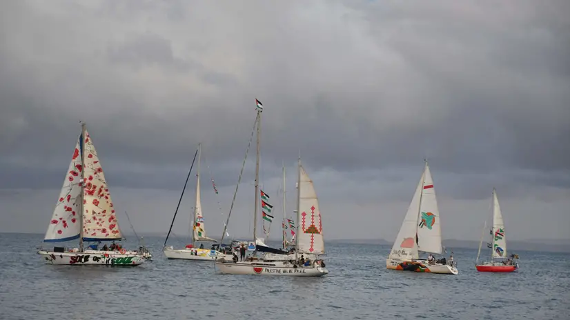 A flotilla of boats leaves the port of San Giovanni Li Cuti in Catania, Sicily, southern Italy, 27 September 2025. The Freedom Flotilla Coalition (FFC) and Thousand Madleens to Gaza (TMTG) announced the launch of a flotilla to Gaza of 10 boats from Catania, with dozens on board. ANSA/ORIETTA SCARDINO