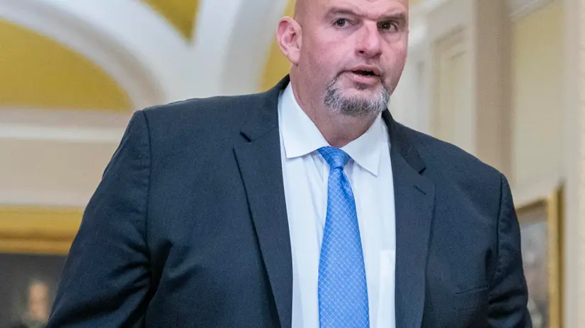 epa11285072 Democratic Senator from Pennsylvania John Fetterman walks to the Senate floor for the impeachment proceedings of US Secretary of Homeland Security Alejandro Mayorkas in Washington, DC, USA, 17 April 2024. Senate Democrats are pushing to dismiss the trial before it even begins. EPA/SHAWN THEW