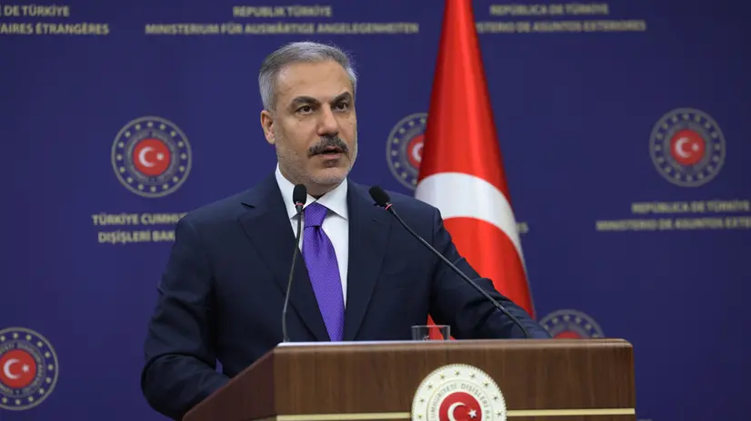epa12297629 Turkish Foreign Minister Minister Hakan Fidan speaks during a joint press conference with his Syrian counterpart Minister Asaad Hassan Al-Shaibani (not seen) after their meeting in Ankara, Turkey, 13 August 2025. EPA/NECATI SAVAS