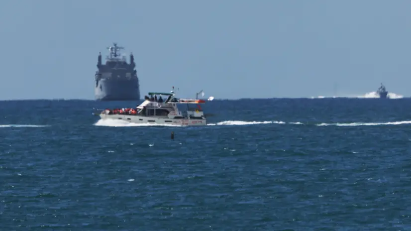 epa12423050 A vessel of the Global Sumud Flotilla arriving at Ashdod port 02 October 2025 after being intercepted whilst carrying aid to Gaza. Israel's Foreign Ministry announced that several vessels that form part of the Global Sumud Flotilla (GSF) had been stopped and that those aboard were being transferred to an Israeli port. EPA/ATEF SAFADI