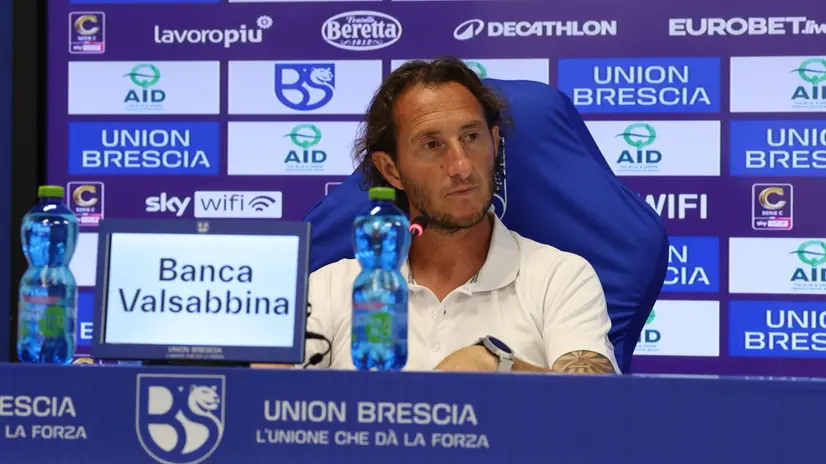 Aimo Diana in conferenza stampa - © www.giornaledibrescia.it