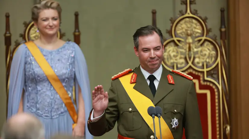 epa12427531 Stephanie, Grand Duchess of Luxembourg (L), looks as Guillaume (C), Grand Duke of Luxembourg is sworn-in during the swearing-in ceremony of the Grand Duke of Luxembourg Guillaume at the Chamber of Deputies in Luxembourg, 03 October 2025. Henri, Grand Duke of Luxembourg abdicated on 03 October 2025 after 25 years on the throne. His eldest son, Lieutenant-Representative Guillaume, succeeded him as Grand Duke of Luxembourg. EPA/OLIVIER HOSLET