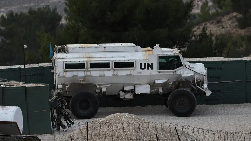 epa11756650 UNIFIL soldiers at the UN base, at the border between Israel and Lebanon as seen from the Israeli side of the border, 04 December 2024. A 60-day ceasefire agreement between Israel and Hezbollah came into force on 27 November. EPA/ATEF SAFADI