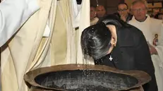 Il battesimo di una donna adulta