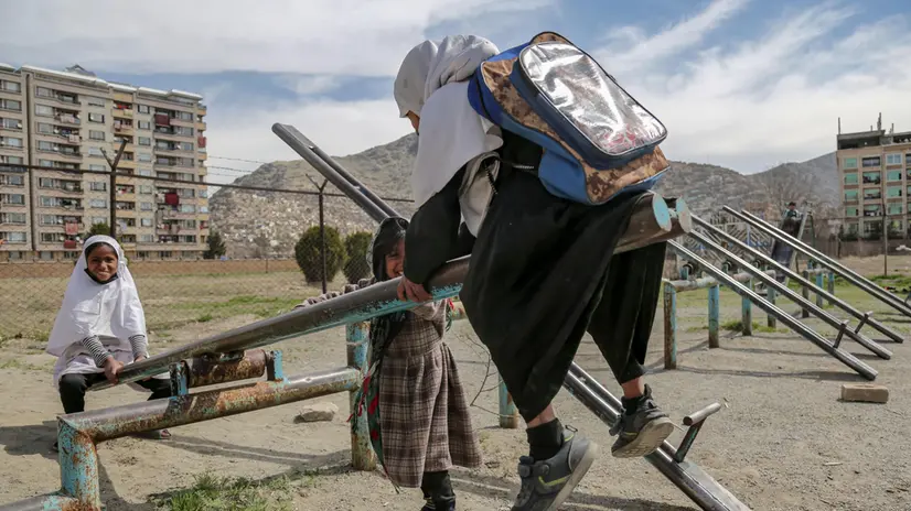 epa11981566 Afghan school girls play at a park in Kabul, Afghanistan, 22 March 2025. UNICEF's Executive Director, Catherine Russell, said the ongoing ban on girls' education beyond sixth grade in Afghanistan could lead to over four million girls being out of school by 2030, with severe consequences for their health and the nation's future. The ban is expected to result in a significant reduction in female health workers, potentially causing the deaths of 1,600 mothers and 3,500 children. EPA/SAMIULLAH POPAL