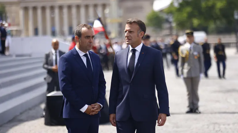 epa12365453 (FILE) - French President Emmanuel Macron (R) and France's Minister of Armed Forces Sebastien Lecornu (L) leave the annual Bastille Day military parade in Paris, France, 14 July 2025 (reissued on 09 September 2025). The Elysee Palace announced on 09 September that Sebastien Lecornu has been named the country's new Prime Minister. Lecornu succeeds Francois Bayrou who was ousted on 08 September after losing a confidence vote in parliament. EPA/MOHAMMED BADRA / POOL