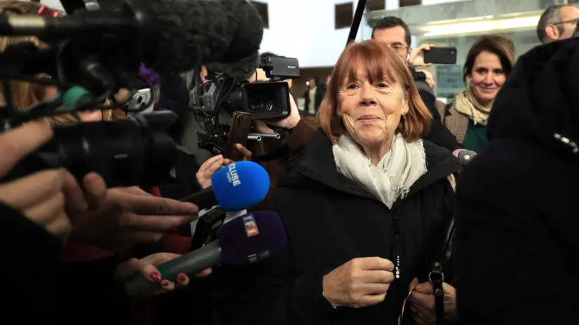 epa11780324 Gisele Pelicot (C) leaves the criminal court where her ex-husband Dominique Pelicot stands trial, in Avignon, South of France, 16 December 2024. Dominique Pelicot is accused of drugging and raping his then-wife, Gisele Pelicot. He is also accused of inviting dozens of men to rape her while she was unconscious at their home in Mazan, France, between 2011 and 2020. Fifty other men are facing trial for their alleged involvement. Dominique Pelicot could face a maximum sentence of 20 years in prison if convicted. EPA/Guillaume Horcajuelo