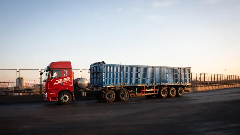 epa11876682 A truck with loads drives on a highway in Tianjin, China, 05 February 2025. The US imposed on 04 February a 10 percent tariff on Chinese goods, to which China responded with countermeasures of a 15 percent tariff on US coal and liquified natural gas; and a 10 percent tariff on US crude oil, agricultural machinery, large-displacement cars and pickup trucks, to take effect on 10 February. EPA/JESSICA LEE