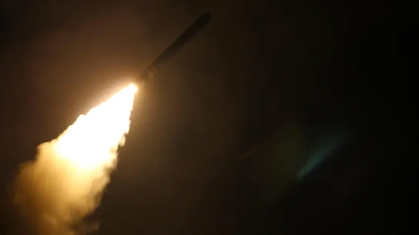 epa06668824 Image dated 14 April 2018 provided by the US Navy showing the guided-missile cruiser USS Monterey (CG 61) fires a Tomahawk land attack missile. Monterey is deployed to the U.S. 5th Fleet area of operations in support of maritime security operations to reassure allies and partners and preserve the freedom of navigation and the free flow of commerce in the region. EPA/Matthew Daniels HANDOUT EDITORIAL USE ONLY/NO SALES