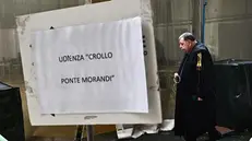 Avvocato a palazzo di Giustizia per il processo sul crollo del ponte Morandi. Genova, 27 marzo 2025. ANSA/LUCA ZENNARO (Avvocati, avvocato, processo, processi, palazzo di giustizia, incartamenti, legale, legali)