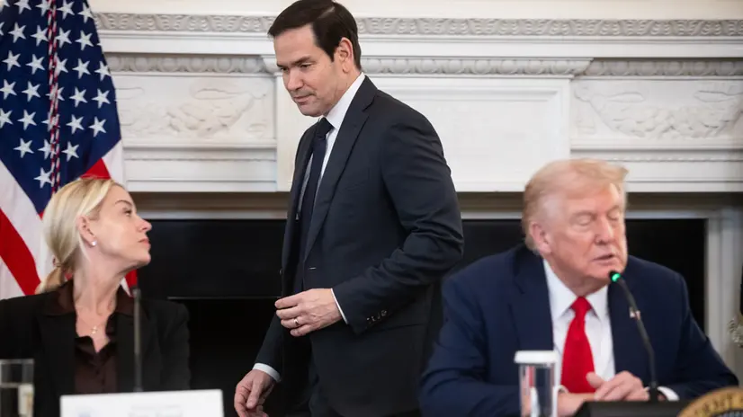 epa12440517 US Attorney General Pam Bondi (L), Secretary of State Marco Rubio (C), and US President Donald Trump (R) attend an event in the State Dining Room at the White House in Washington, DC, USA, 08 October 2025. Trump on 22 September designated antifa as a 'domestic terrorist organization' via executive order. EPA/FRANCIS CHUNG / POOL
