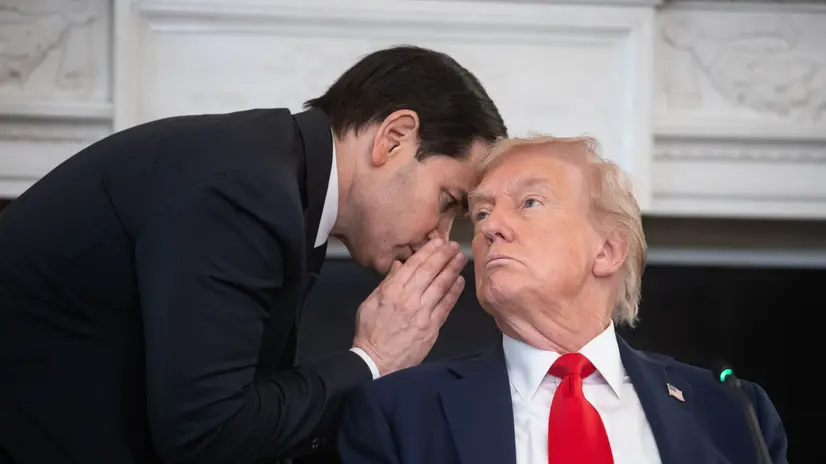 epa12440529 US Secretary of State Marco Rubio (L) whispers to President Donald Trump (R) during a Roundtable on Antifa in the State Dining Room of the White House in Washington, DC, USA, 08 October 2025. Trump on 22 September designated antifa as a 'domestic terrorist organization' via executive order. EPA/FRANCIS CHUNG / POOL