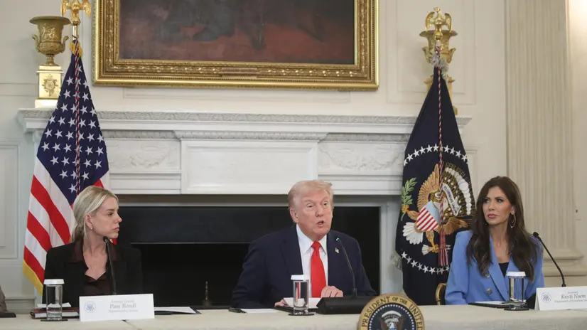 epa12440390 US President Donald Trumps (C) is joined by Attorney General Pam Bondi (L) and DHS Secretary Kristi Noem during a Roundtable on Antifa movement in the State Dining Room of the White House in Washington, DC, USA, 08 October 2025. Trump on 22 September designated antifa as a 'domestic terrorist organization' via executive order. EPA/FRANCIS CHUNG / POOL