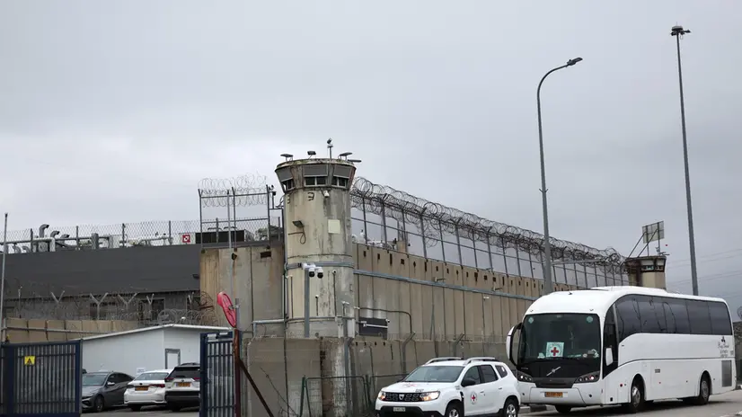 epaselect epa11914587 Vehicles of the International Committee of the Red Cross (ICRC) arrive to the West Bank military prison of Ofer to receive Palestinian prisoners as part of an Israel-Hamas ceasefire deal, north of Jerusalem, 22 February 2025. Israel and Hamas implemented the first phase of a hostage release and ceasefire deal on 19 January 2025. More than 48,000 Palestinians have been killed in the Gaza Strip, according to the Palestinian Ministry of Health, since Israel launched a military campaign in the strip in response to a cross-border attack led by the Palestinian militant group Hamas on 07 October 2023, in which about 1,200 Israelis were killed and more than 250 taken hostage. EPA/ATEF SAFADI