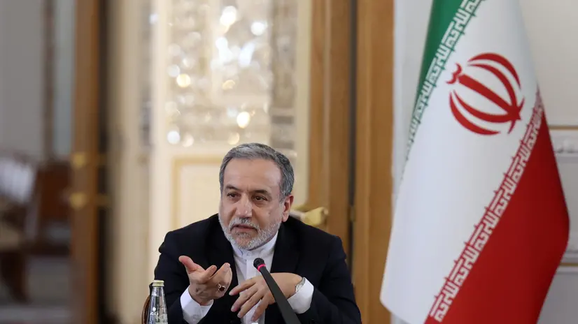 epa12431996 Iranian Foreign Minister Abbas Araghchi speaks during a meeting with foreign ambassadors and diplomats to Iran, in Tehran, Iran, 05 October 2025. Araghchi briefed the foreign diplomats on developments related to Iran's nuclear file and the snapback mechanism. EPA/ABEDIN TAHERKENAREH