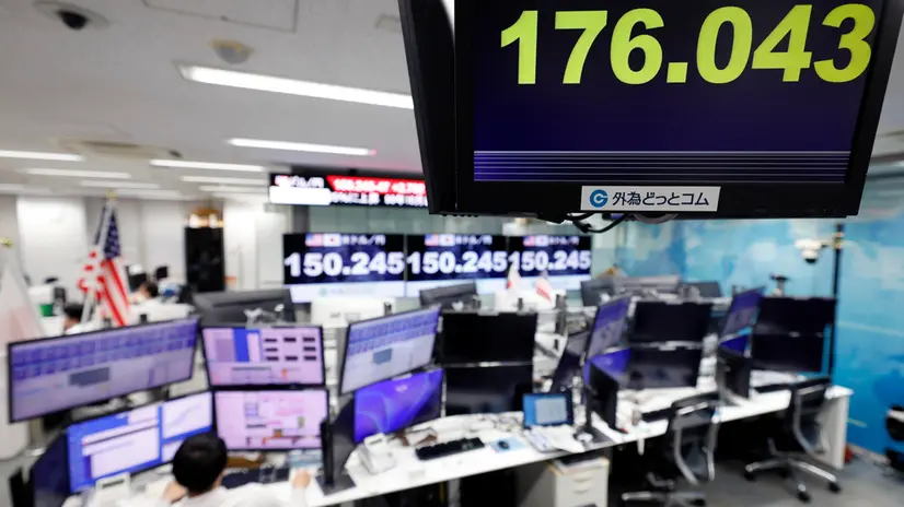 epa12434170 A monitor displays the current exchange rate of the Japanese yen against the Euro at a foreign exchange brokerage in Tokyo, Japan, 06 October 2025. The Nikkei stock index soared following the election of Sanae Takaichi at the head of ruling LDP party, gaining almost 5 percent to cross the 48,000 mark for the first time. The yen also plunged against the US dollar to the 150 yen level, and against the euro to reach the 176 yen level, its lowest level ever. The 225-issue Nikkei Stock Average gained 2,175.26 points, or 4.75 percent, to close at 47,944.76. EPA/FRANCK ROBICHON