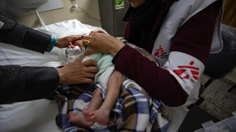 epa11149763 Members of the Spanish branch of Médecins Sans Frontières provide health care and vaccinations to displaced people in the Rafah camp in the southern Gaza Strip, 13 February 2024. Since 07 October 2023, up to 1.9 million people, or more than 85 percent of the population, have been displaced throughout the Gaza Strip, some more than once, according to the United Nations Relief and Works Agency for Palestine Refugees in the Near East (UNRWA), which added that most civilians in Gaza are in 'desperate need of humanitarian assistance and protection'. EPA/HAITHAM IMAD