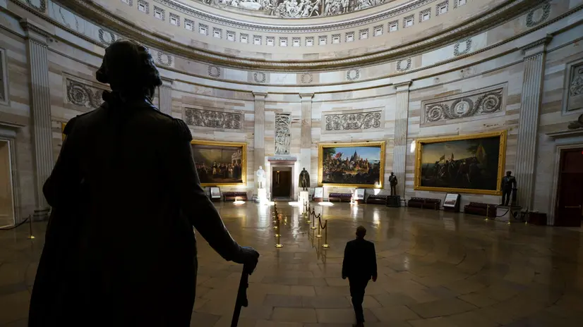 epa12445295 A member of staff walks through an empty Rotunda at the US Capitol in Washington, DC USA, 10 October 2025. The US government shutdown has entered day ten, with the US administration signaling that layoffs of federal workers are imminent and could be permanent. EPA/WILL OLIVER