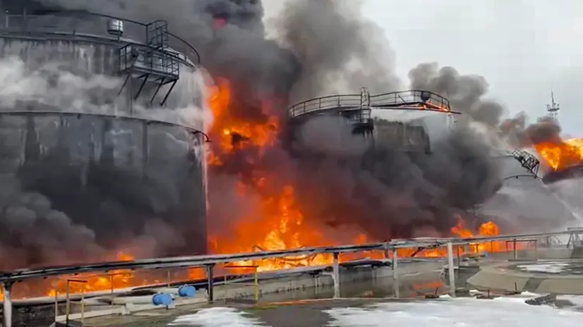 epa11089527 A still image taken from a handout video provided Â by the Russian Emergencies Ministry Press-Service shows Russian firefighters extinguishing a fire following a reported drone attack on the territory of the Klintsevskaya oil depot, near Bryansk, Bryansk region, Russia, 19 January 2024. Oil storage tanks caught fire after a Ukrainian drone attacked an oil depot in Klintsy, Russia's Bryansk region, regional governor Aleksandr Bogomaz wrote on telegram, adding that there were no casualties in the incident. Some 32 residents of the private sector were temporarily evacuated and more than 140 people were deployed to fight the fire. EPA/RUSSIAN EMERGENCIES MINISTRY HANDOUT -- BEST QUALITY AVAILABLE -- HANDOUT EDITORIAL USE ONLY/NO SALES HANDOUT EDITORIAL USE ONLY/NO SALES