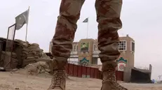 epa11800076 Pakistani soldier stands guard at Pak-Afghan border in Chaman, Pakistan, 31 December 2024. Tensions between Afghanistan and Pakistan escalated over the last week as the Taliban conducted strikes across the Durand Line, targeting alleged militant hideouts in response to Pakistan's recent airstrikes on Paktika, where over 40 people were killed, according to Taliban officials. EPA/AKHTER GULFAM