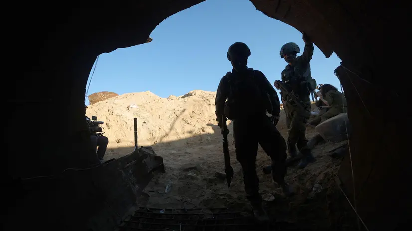 epa11034235 A photo taken while embedded with the Israeli Army shows soldiers at the entrance of a tunnel 400 meters away from the Erez crossing between Gaza and Israel, in the Palestinian town of Beit Hanun, northern Gaza Strip, 15 December 2023 (issued 17 December 2023). At least 18,000 Palestinians and at least 1,200 Israelis have been killed, according to the Palestinian Health Ministry and the Israel Defense Forces (IDF), since Hamas militants launched an attack against Israel from the Gaza Strip on 07 October, and the Israeli operations in Gaza and the West Bank which followed it. EPA/ATEF SAFADI