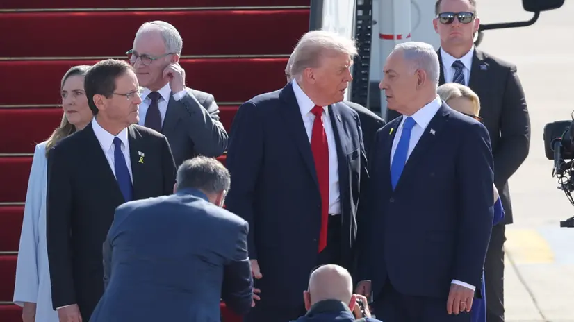 epa12449935 Israeli Prime Minister Benjamin Netanyahu (R), accompanied by Israeli President Isaac Herzog (L), welcomes US President Donald Trump (C) at Ben Gurion Airport in Tel Aviv, Israel, 13 October 2025. According to a parliament spokesperson for the Israeli Knesset, President Trump will deliver a speech at the Knesset on 13 October 2025 in light of a first phase ceasefire and hostages release deal between Israel and Hamas. US President Trump will then travel to Sharm el Sheikh, Egypt for a Peace Summit co-chaired with Egyptian President Abdel Fattah al Sisi and participation by around 20 world leaders with a goal to end the war in the Gaza Strip and enhance efforts to bring peace and stability to the Middle East. EPA/ABIR SULTAN