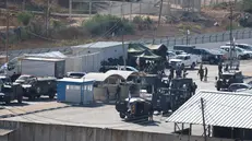 epaselect epa12449941 Israeli forces take security measures at the Ofer military prison compound ahead of the expected release of Palestinian prisoners in the Israel-Hamas release deal, near the West Bank city of Ramallah, 13 October 2025. As part of the ceasefire agreement between Israel and Hamas, some 20 Israeli captives and around 2,000 Palestinian prisoners are scheduled to be released on 13 October. EPA/ALAA BADARNEH