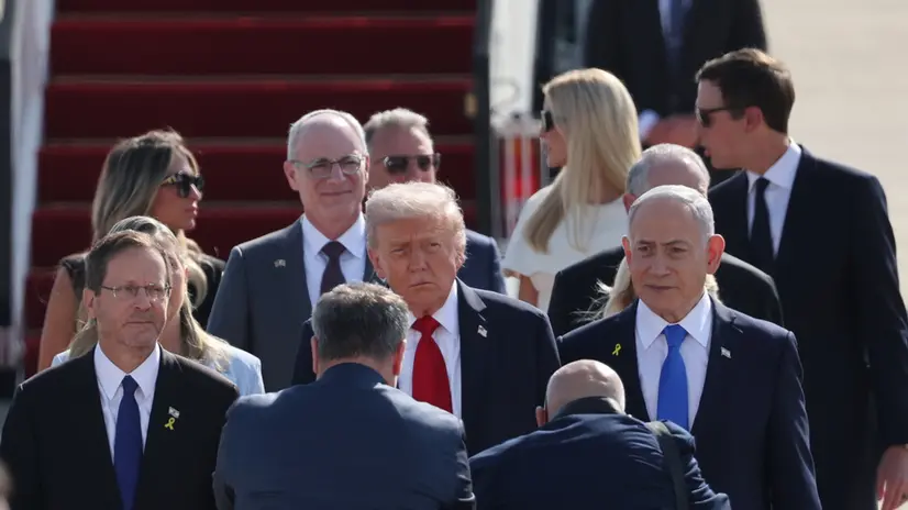 epa12449934 Israeli President Isaac Herzog (L), US President Donald Trump (C), and Israeli Prime Minister Benjamin Netanyahu at Ben Gurion Airport in Tel Aviv, Israel, 13 October 2025. According to a parliament spokesperson for the Israeli Knesset, President Trump will deliver a speech at the Knesset on 13 October 2025 in light of a first phase ceasefire and hostages release deal between Israel and Hamas. US President Trump will then travel to Sharm el Sheikh, Egypt for a Peace Summit co-chaired with Egyptian President Abdel Fattah al Sisi and participation by around 20 world leaders with a goal to end the war in the Gaza Strip and enhance efforts to bring peace and stability to the Middle East. EPA/ABIR SULTAN
