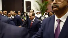 epa12450863 Egyptian President Abdel Fattah al-Sissi arrives at a meeting at the Gaza Peace Summit in Sharm el-Sheikh, Egypt, 13 October 2025. US President Donald Trump alongside Egypt's President Abdel Fattah al-Sisi with leaders from more than 20 countries attend the summit in Sharm El-Sheikh. The first phase of Gaza peace plan between Israel and Hamas involves the release of Israeli hostages and Palestinian prisoners, the partial withdrawal of Israeli forces, and the delivery of humanitarian aid to Gaza. EPA/YOAN VALAT /POOL