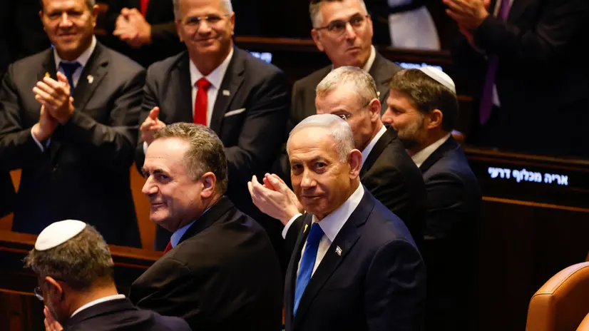 epa12450522 Israeli Prime Minister Benjamin Netanyahu reacts as he arrives for the US President's address to the Israeli parliament, the Knesset, in Jerusalem, 13 October 2025. Hamas handed over the 20 surviving Israeli hostages on October 13 under a ceasefire agreement, as the US president and other world leaders geared up for a summit on Gaza. The releases are part of a ceasefire agreement brokered by the US president, with Israel due in return to free nearly 2,000 detainees held in its jails in exchange. EPA/JALAA MAREY / POOL