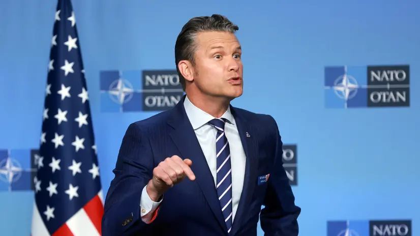 epa12454734 US Secretary of War Pete Hegseth speaks as he is received by NATO Secretary General Mark Rutte (not pictured) before NATO Ministers of Defence meeting in Brussels, Belgium, 15 October 2025. The meeting of the North Atlantic Council in Defence Ministers' Session will be followed by a Ukraine Contact Group meeting. EPA/OLIVIER HOSLET