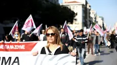 epa12452619 Demonstrators take part in a protest march, which is taking place within the framework of a 24-hour pan-labor strike, in Thessaloniki, Greece, 14 October 2025. The Labor Center of Thessaloniki (EKTh) and the Civil Servants' Confederation (ADEDY) are proceeding with a 24-hour pan-labor strike, reacting to the regulations of the new labor bill that is being discussed in the Plenary Session of the Parliament and institutionalizes the '13-hour workday.' EPA/ACHILLEAS CHIRAS