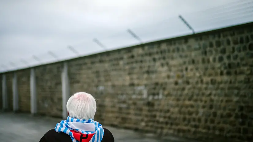 epaselect epa05949143 A visitor walks through the former Austrian Nazi concentration camp Mauthausen during a memorial event on the anniversary of the Nazi camp's liberation in Mauthausen, Austria, 07 May 2017. Survivors took part in a commemoration ceremony marking the 72nd anniversary of the liberation of the prisoners by US forces on 08 May 1945. EPA/CHRISTIAN BRUNA