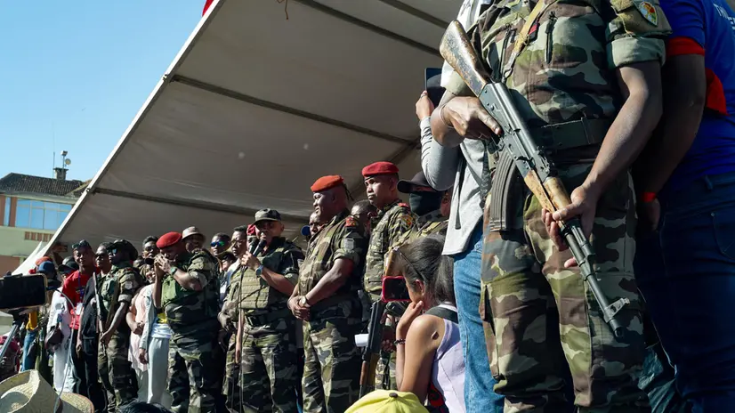 epa12453125 Members of the military address the crowd in Antananarivo, Madagascar, 14 October 2025. Madagascar's president Andry Rajoelina has confirmed he has fled the country during an address to the nation on social media after, an elite military unit, CAPSAT joined the protesters over the weekend. Members of Parliament in the National Assembly have voted to impeach President Andry Rajoelina. EPA/HENITSOA RAFALIA