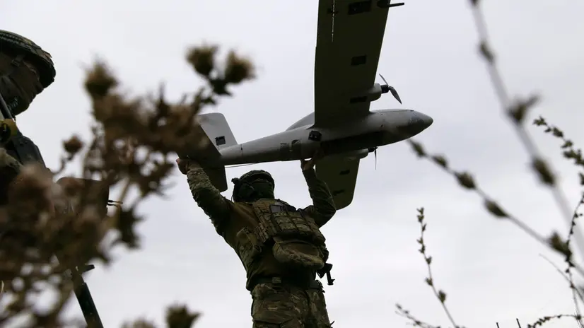 epaselect epa12403840 Ukrainian servicemen of the 22nd Mechanized Brigade prepare an 'Evanger' UAV for a flight at an undisclosed location near the frontline in the Kharkiv region, northeastern Ukraine, 24 September 2025 (issued 25 September 2025), amid the Russian invasion. The 'Evanger', a long-range unmanned aerial vehicle (UAV), has a maximum range of 80km, a tactical radius of 40km, and can fly for up to 80 minutes, using a hand-launch and parachute landing system. EPA/YEVHEN TITOV