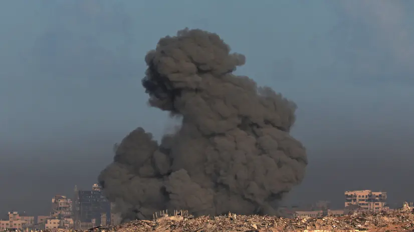 epa12436159 Smoke rises as a result of an Israeli strike on the outskirts of Gaza City as seen from the Israeli side of the border, 07 October 2025. October 07 marks two years since the Palestinian militant group Hamas launched a surprise attack on Israel, taking dozens of hostages and killing nearly 1,200 people. In response, Israel began its war on Gaza, which has killed more than 66,000 people, displaced millions and destroyed the Palestinians enclave. EPA/ATEF SAFADI