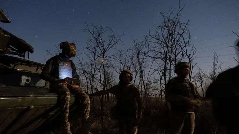 epa12227139 Ukrainian air defence system operators check on their tablet the evolving threats on Ukraine's southern front line on the night Russia launched the largest combined air strike since it began its full-scale invasion, at an undisclosed location, Ukrain, 08 July 2025. The unit operates a Ukrainian 9K33 "OSA" (translated as "wasp") system that works with guided missiles, capable of hitting high-flying objects, and is one of the most widely used by both the Russian and Ukrainian armies in the Ukrainian war. EPA/Maria Senovilla